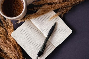 Background for design notebook, pen, coffee.