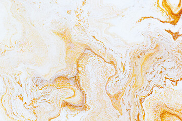 Gold liquid marble background. Used in design for skin tile ,wallpaper, interiors backdrop. Picture...