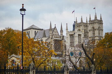 Scenic view of famous Westminster Abbey in London, UK, on foggy fall day