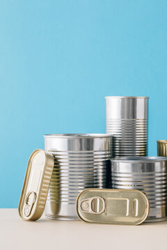 Set of stacked unopened cans