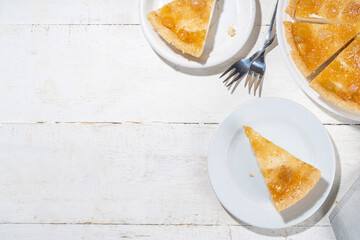Homemade caramel apple pie cheesecake, sweet cheese  apple cake with caramelized apple sauce