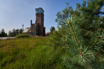 Tower (Hornisgrindeturm). Viewpoint in national park north black forest in front of blue sky in...