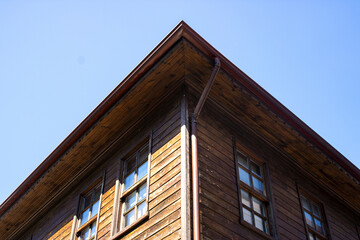 A blue sky and wooden house