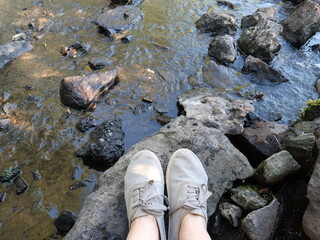 feet on the rocks