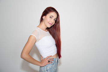 young latina woman, redhead and long hair
