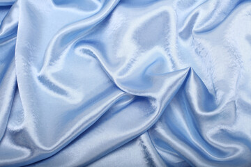 Blue pearl wave fabric silk. Abstract texture horizontal copy space background.