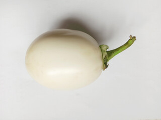 white round eggplant on white background