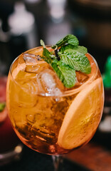 Drink with Gin, orange and mint served in Brazilian Pub