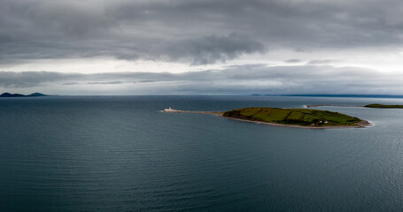 aerial view of the Clare Island lighthouse on one of the sunken drumlin islands in Clew Bay in County Mayo of western Ireland