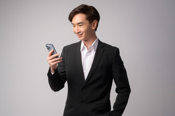 Young businessman wearing  suit over white background studio