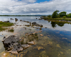 picturesque summer landscape of Lough Corrib Lake in County Galway at Kilbeg Pier