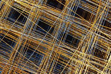 Steel rebars for reinforced concrete, welded steel reinforcement mesh texture in construction site