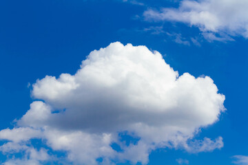 Naklejka na ściany i meble Clouds in the sky. White cloud in the blue sky.