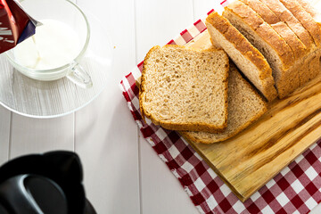 loaf bread or whole bread with natural fermentation, in a breakfast scene or afternoon coffee break
