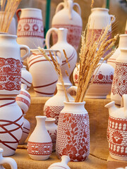 Different handmade ceramic pots to sell painted