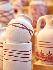 Different handmade ceramic pots to sell painted