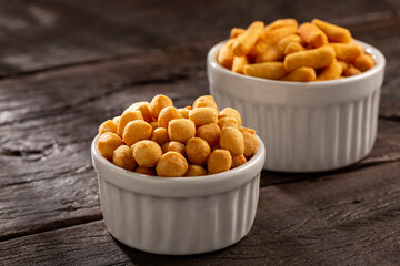 Snacks in ramekin on the table.