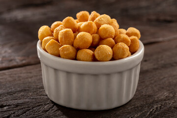 Snacks in ramekin on the table.