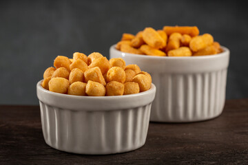 Snacks in ramekin on the table.