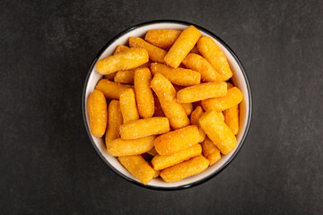 Snacks in ramekin on the table.