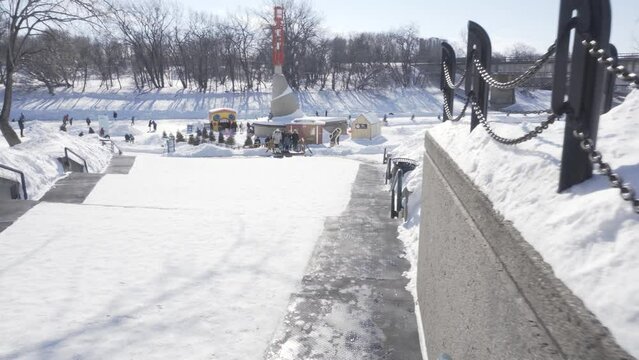 Winnipeg, Manitoba - Canada - February 27, 2022: Walking Around The Forks Market in a Sunny Winter Day.