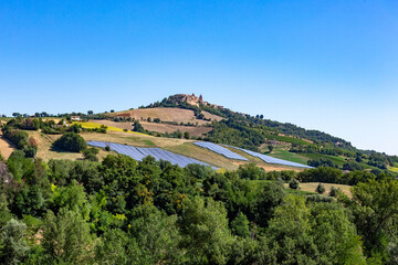 Solarcells on the green hills of the village of Montedinove on a altitude of 561 m in the Italian...