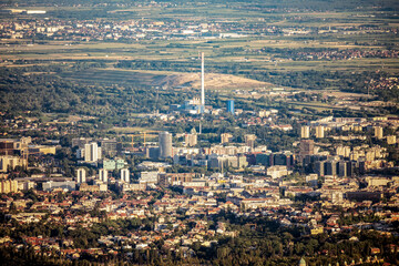 Aerial view of Zagreb city from above, with numerous landmarks visible in the distance