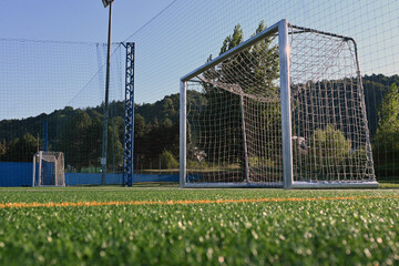Soccer goal posts and artificial grass field at the sports center in town of Samobor