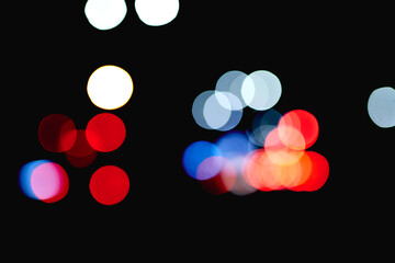 bokeh colored circles of light on black background