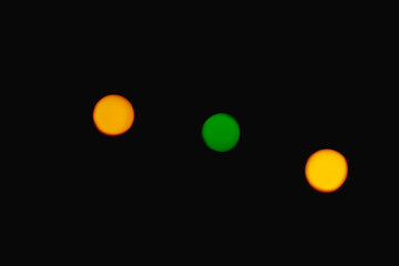 bokeh colored circles of light on black background