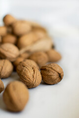 Handful of walnuts on a light table
