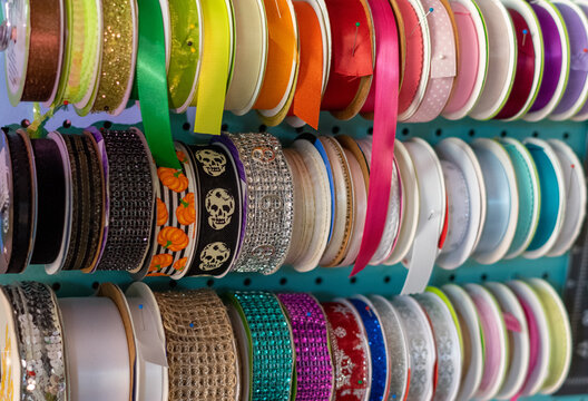 stack of colorful ribbon spools