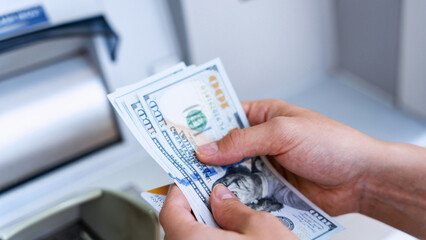 Atm cash machine money. Woman withdraw money dollar bill. Holding american hundred cash. Money...
