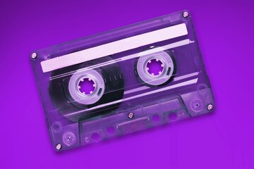 One single simple light  analog audio cassette tape object. Retrowave, synthwave retro vintage