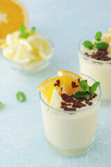 Orange lemon citrus milk mousse in glasses