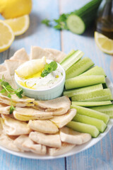 Tzatziki, Greek dip sauce with pita and cucumbers	