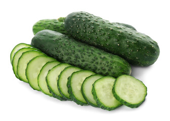 Whole and cut cucumbers on white background