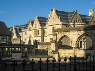 Old houses and arched construction in the old part In Gloucester