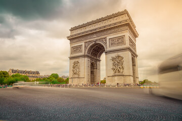 Triumphal Arch in Charles de Gaulle square with blurred cars, Paris