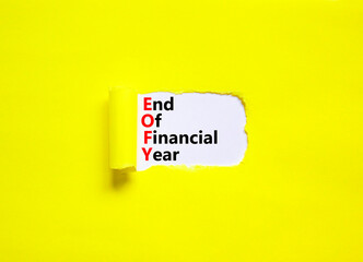 EOFY end of financial year symbol. Concept words EOFY end of financial year on white paper on beautiful yellow background. Black calculator and pen. Business and EOFY end of financial year concept.