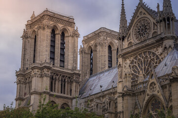Notre Dame of Paris towers, columns and archs, side view, France