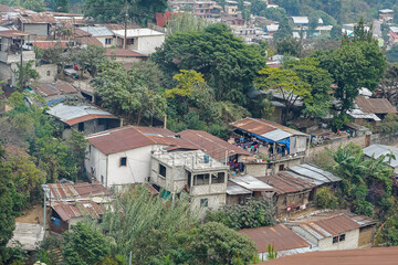 Beautiful aerial view of San Juan la Laguna small town in the Guatemala Atitlan lake - Umbrella Streets, colorful people and tourists