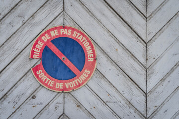 no parking sign on a french garage