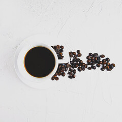 cup of coffee with beans