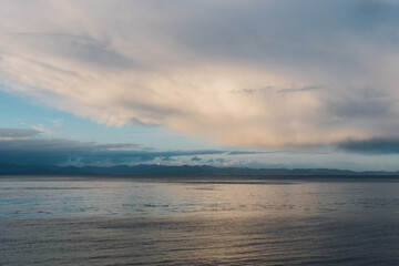 seascape with clouds, looking out at Pacific Ocean towards Canada