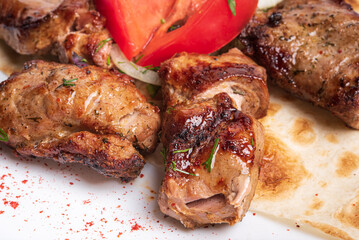 Pork skewers. Grilled meat skewers.