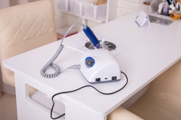 
Working place for nail care master in beauty salon. Modern design and interior.