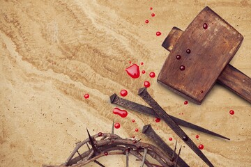 Crucifixion Of Jesus Christ. Cross With Nails And Crown Of Thorns on ground