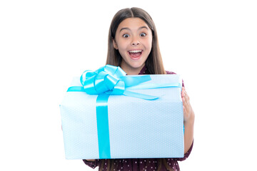 Cute teenager child girl congratulate with valentines day, giving romantic gift box. Present, greeting and gifting concept. Birthday holiday concept. Portrait of emotional amazed excited teen girl.