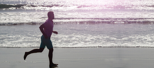 Man running and jumping, banner with copy space.sprinter silhouette. endurance and stamina. sport...